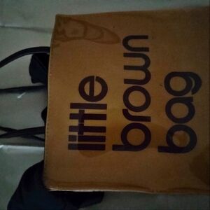 Bloomingdale's small rubber tote no flaws